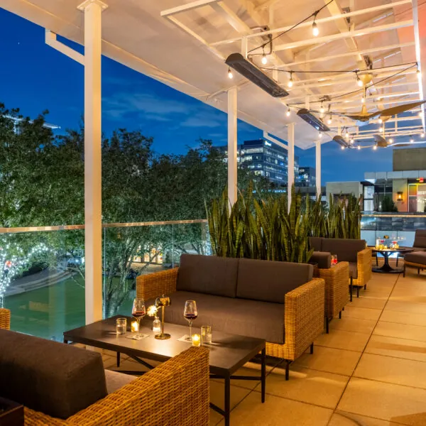 Outdoor dining setup with mountain views.
