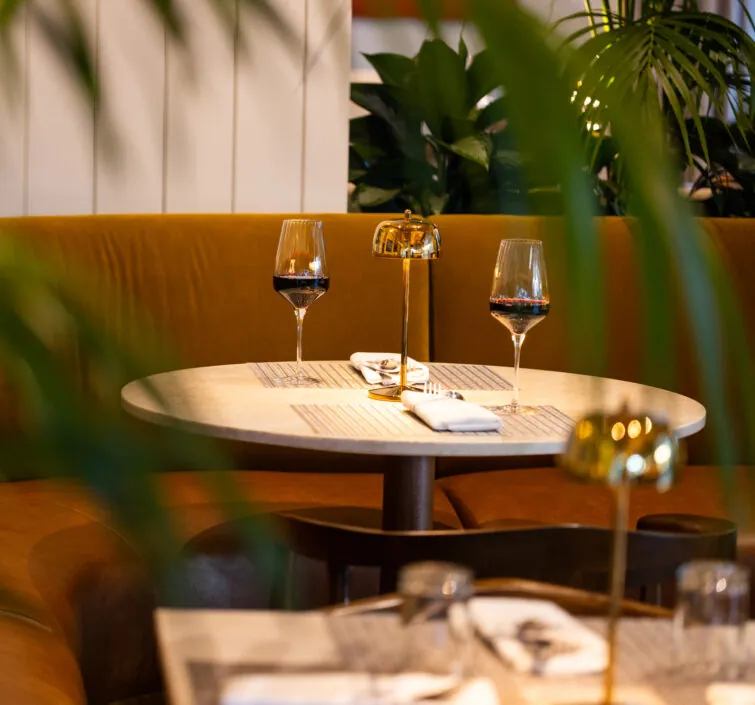 Elegant table setting with wine glasses.