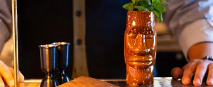 Decoration with green leaves on a bar counter.